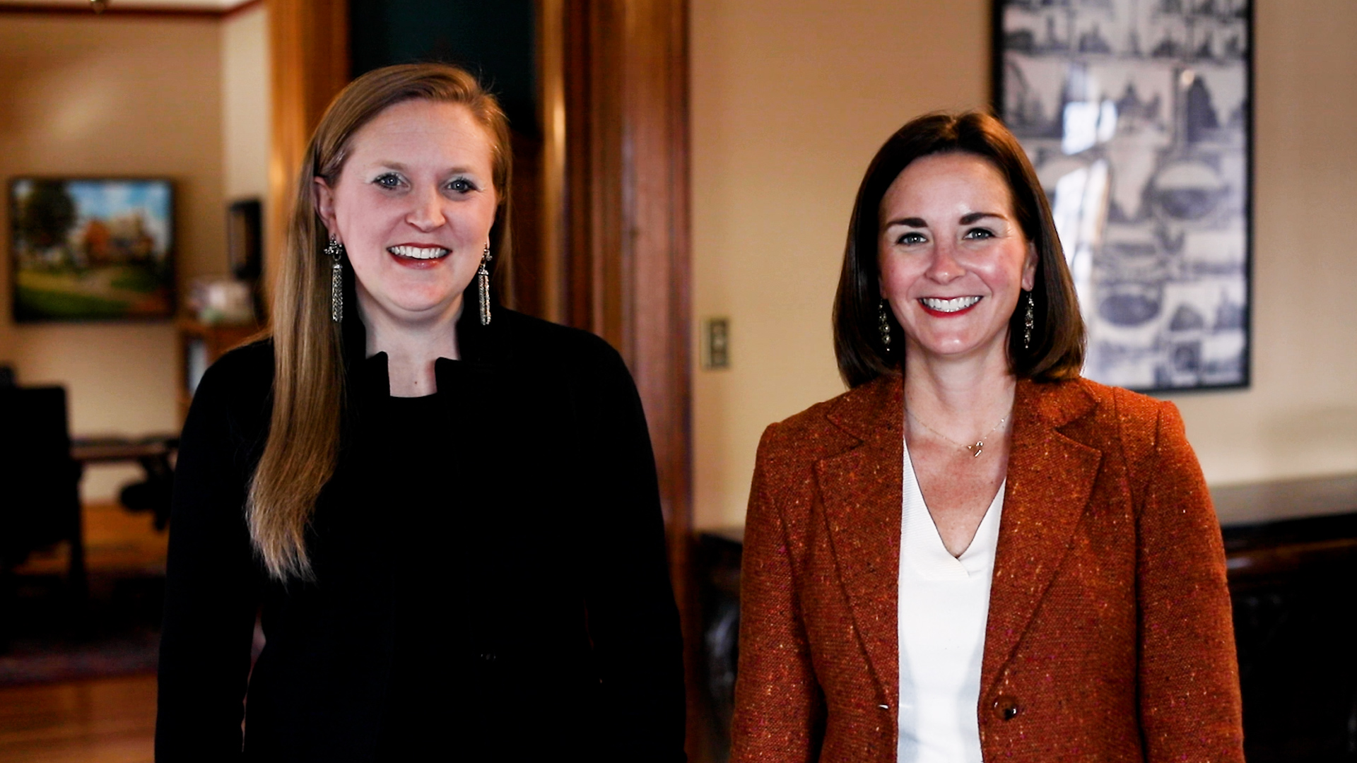 Two women smiling at the camera